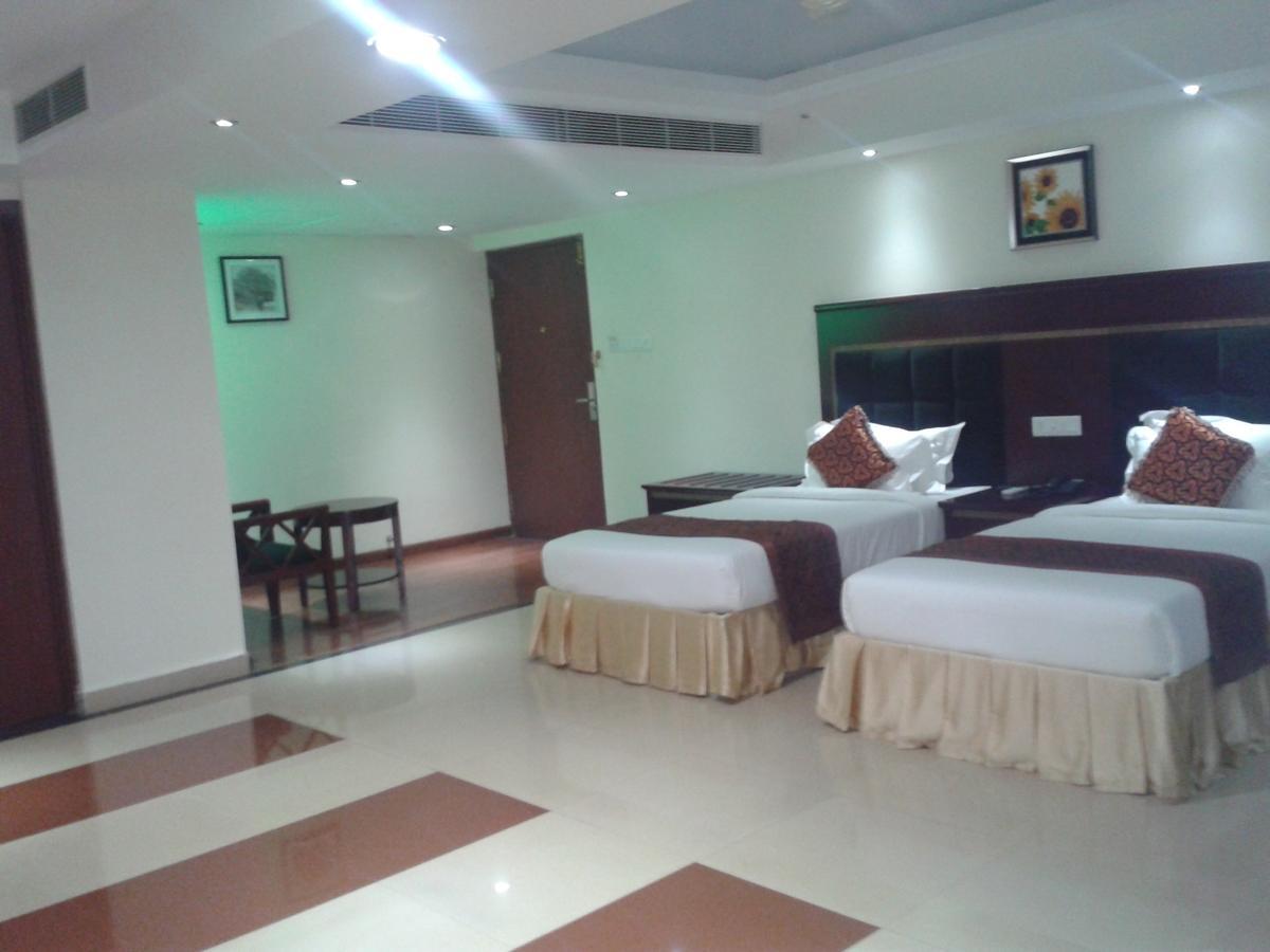 Hotel Hiton Perintalmanna Oda fotoğraf
